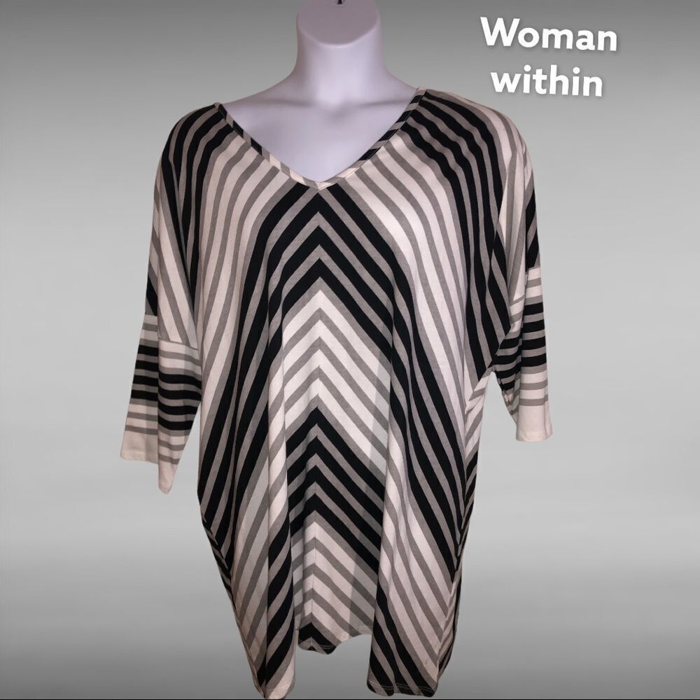 Woman within black, gray and white striped